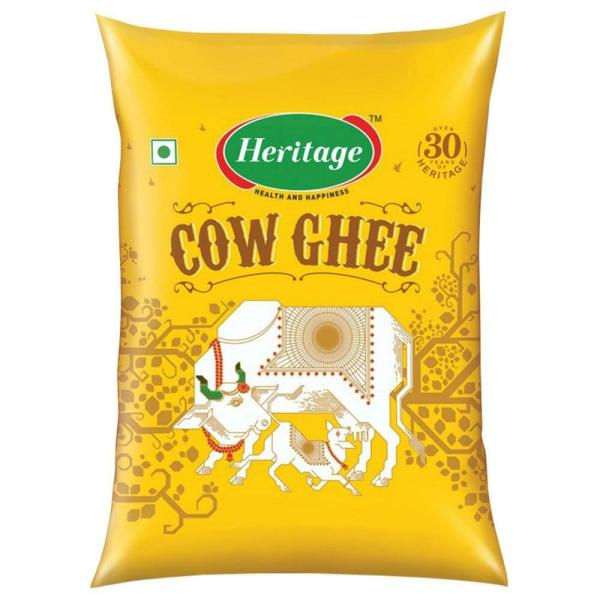 Pure cow ghee in ceramic bowl steel